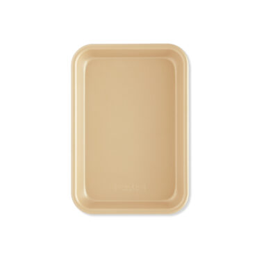Two Nordic Ware aluminum eighth sheet baking pans with nonstick coating, rectangular with raised rims