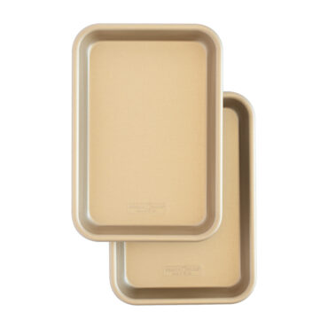 Two Nordic Ware aluminum eighth sheet pans with nonstick coating, natural silver finish, stacked and overlapping