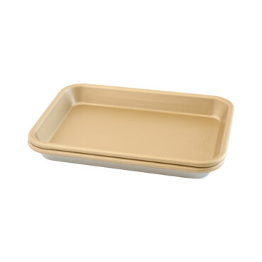 Two Nordic Ware aluminum eighth sheet pans stacked, natural silver finish with nonstick coating