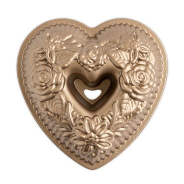 Nordic Ware aluminum floral heart bundt pan, overhead view showing intricate flower pattern interior design
