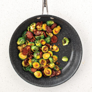 Basalt 10in Skillet lifestyle image with Brussel sprouts, overhead