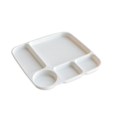Nordic Ware white plastic divided dinner tray with three compartments containing colorful prepared foods