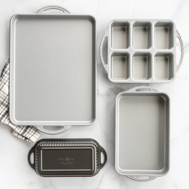 Nordic Ware ProCast aluminum bakeware set: sheet pan, mini loaf pan, classic loaf pan, and 7x11 baking pan