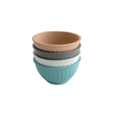Four white ceramic mini bowls with handles stacked nested together, Nordic Ware prep and serve set