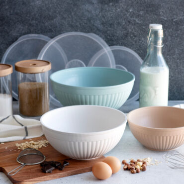 Nordic Ware 6-piece covered bowl set with nesting bowls in various sizes, white with colorful lids