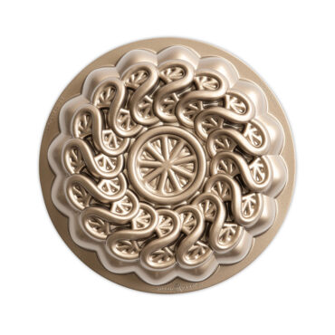 Nordic Ware aluminum Citrus Twist cake pan with detailed citrus slice pattern molded into interior surface