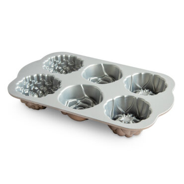 Nordic Ware aluminum floral cakelet pan with six flower-shaped cavities, natural silver finish