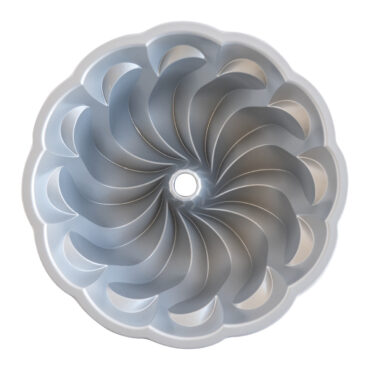 Nordic Ware Pirouette Bundt pan interior view, aluminum with intricate swirled fluted pattern design