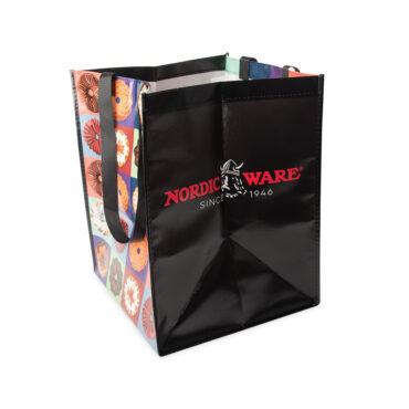 Side angle of Bundt Resusable Tote Bag showcasing black sides with Nordic Ware Logo