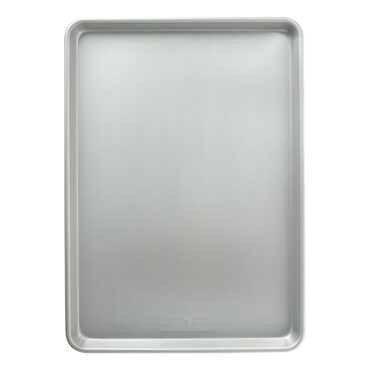 Nordic Ware Brilliant Big Sheet Pan, rectangular aluminum baking pan with raised rim, interior view