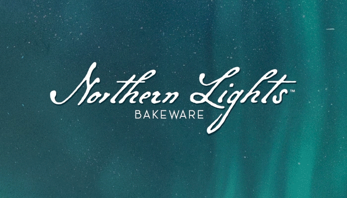 Northern Lights Bakeware logo in the center of the screen with a fading background from an image of the Northern Lights to to an image of the Northern Lights Bakeware Collection of all of the different colors and styles offered in the line. This includes new swirl Bundt pans, formed aluminum Bundt pans, donut pans, specialty bakeware, and dog pans in all four new Northern Lights colors: Twilight Blue, Aurora Green, Golden Hour, and Glacier White.