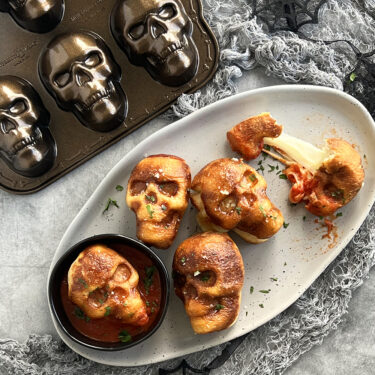 Visit Cheesy Garlic Bread Skulls Recipe