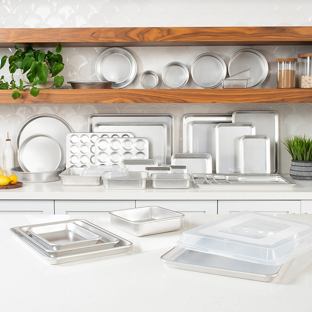 Image of kitchen shelves and counter showcasing Nordic Ware's top-rated Naturals Bakeware Collection