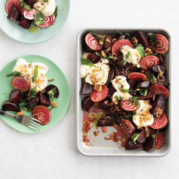 Nordic Ware nonstick quarter sheet pan with roasted red beets, overhead view with plated beets alongside