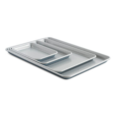Nordic Ware 4-piece nonstick bakeware set with aluminum sheet pans in various sizes, dark coating