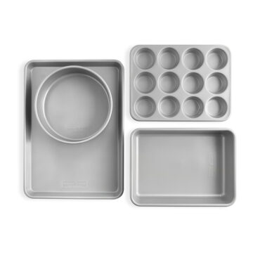 Nordic Ware Brilliant Bakeware nonstick baking pan set with four dark gray rectangular pans of varying sizes