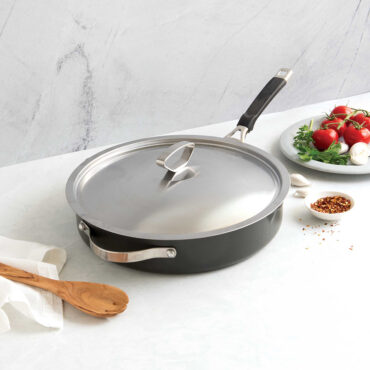 Verde 12-inch skillet with lid, containing seared vegetables and protein, non-stick green ceramic coating