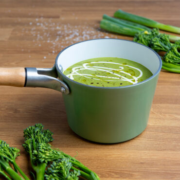 Nordic Ware cardamom ceramic nonstick 1.5 quart saucepan with handle, containing creamy soup