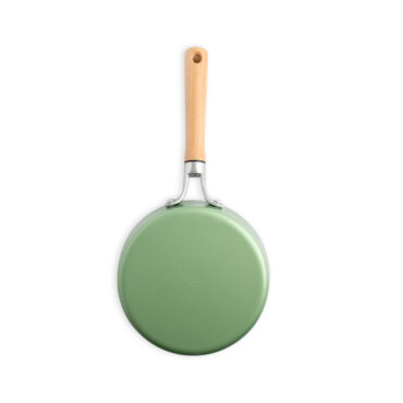 Nordic Ware Cardamom 8-inch ceramic nonstick skillet, cream exterior with black handle, overhead view