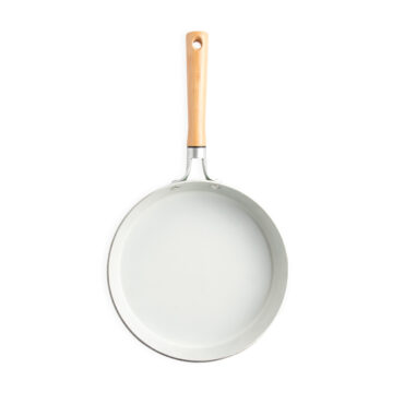 Nordic Ware Cardamom ceramic nonstick 10-inch skillet interior, cream-colored cooking surface with raised sides