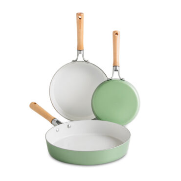 Nordic Ware Cardamom 3-piece nonstick frying pan set in cream white, nested together showing different sizes