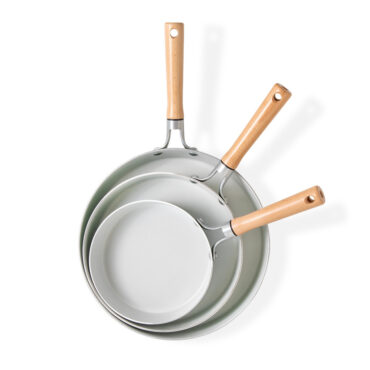 Nordic Ware Cardamom 3-piece nonstick frying pan set in sage green, nested together on white background