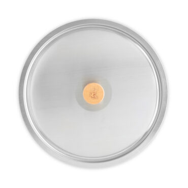 Nordic Ware 12-inch stainless steel lid with cardamom-inspired design, circular with centered handle