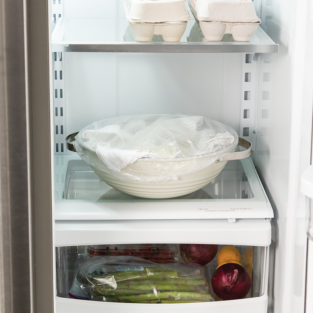 Image of cold proofing in the fridge using proofing lid