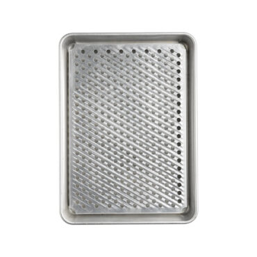 Nordic Ware aluminum high-sided half sheet pan with wire cooling rack, natural silver finish, overhead view