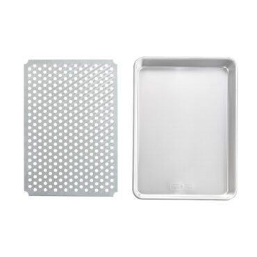 Nordic Ware aluminum high-sided half sheet pan with wire cooling rack, natural silver finish, overhead view