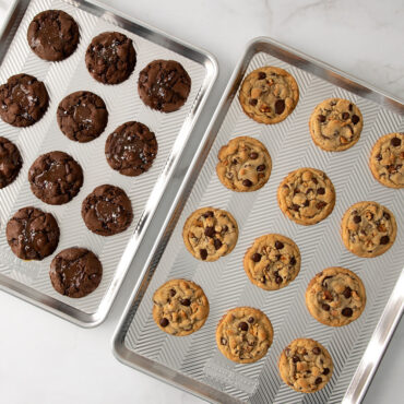 Assorted baked cookies on Nordic Ware Prism aluminum sheet pan with geometric ridged surface