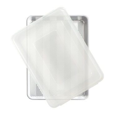 Nordic Ware aluminum rectangular high-sided sheet cake pan with clear plastic lid, natural silver finish