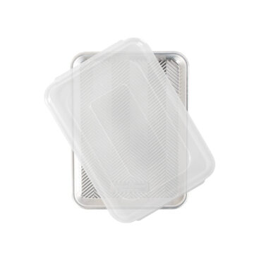 Nordic Ware aluminum quarter sheet baking pan with clear plastic lid, natural silver finish, overhead view