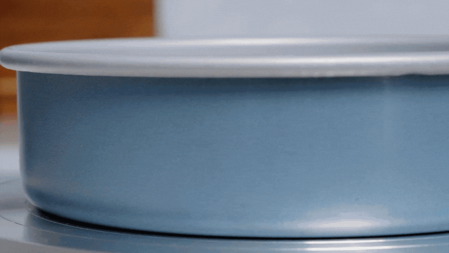 Gif showing a marbled cake being baked in a Brilliant Bakeware 9 inch round cake pan.