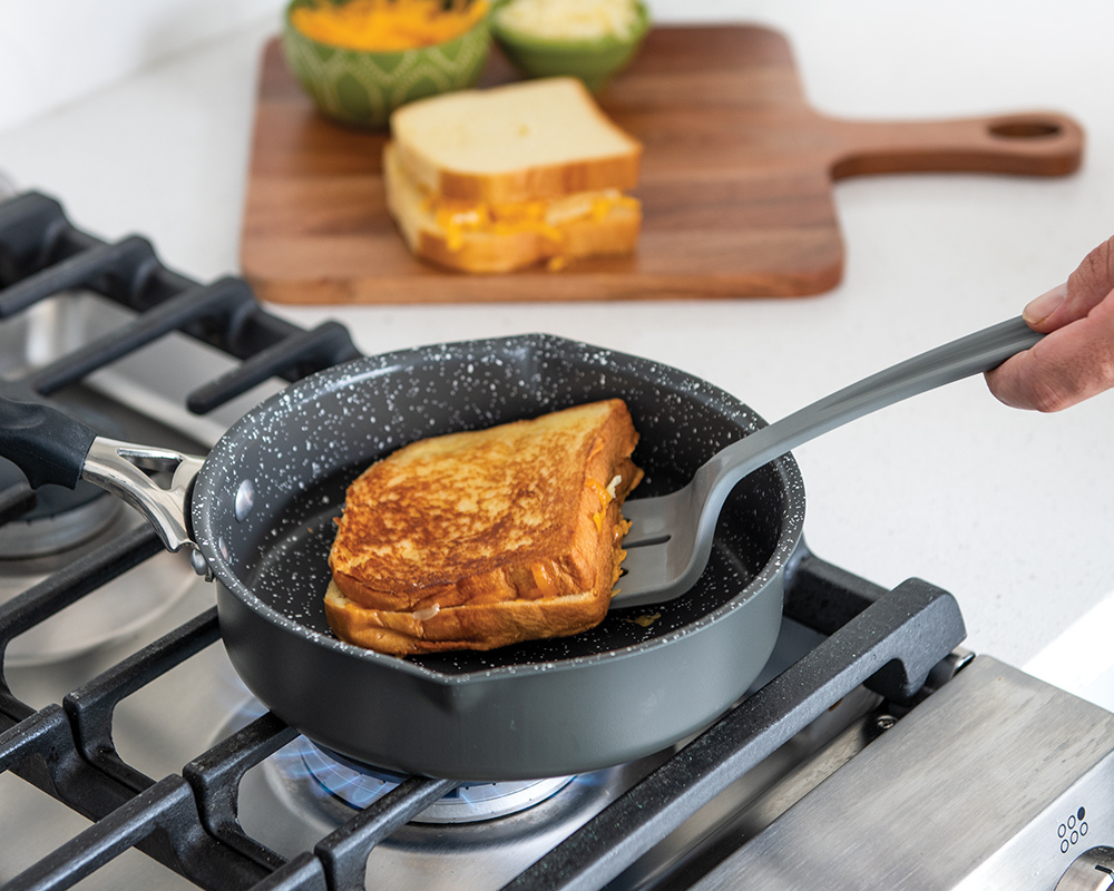 Grilled Cheese Verde 8 Inch Ceramic Nonstick Skillet Pan Making a grilled cheese in a Verde 8 Inch Ceramic Nonstick Skillet Pan on the stovetop.