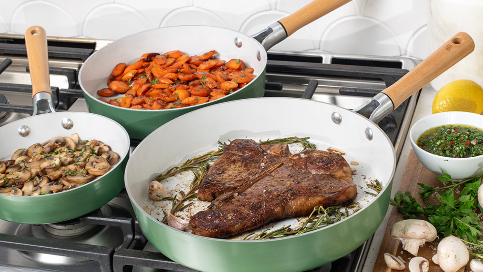 Cardamom™ 3 Piece Nonstick Frying Pan Set Three Cardamom Nonstick Ceramic Skillets cooking food on a stovetop.