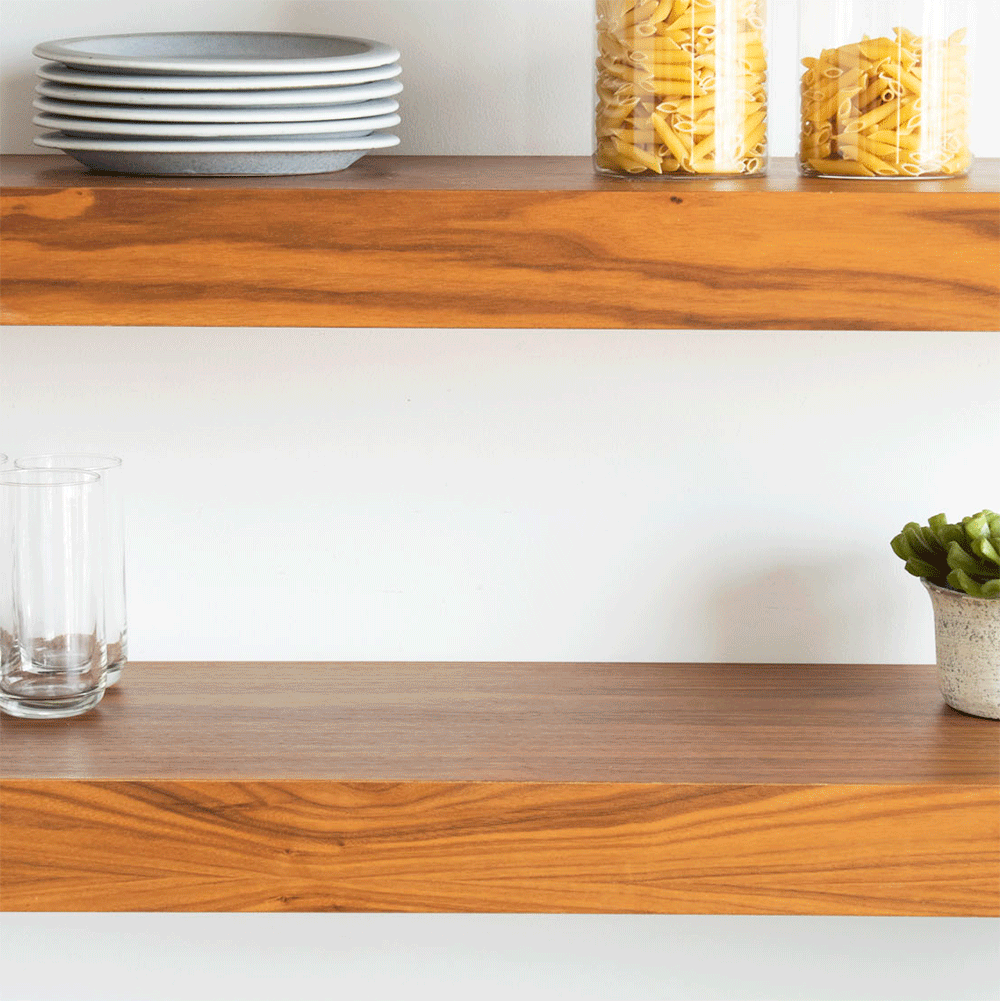 GIF of Naturals 5 Piece Set on kitchen shelf, pans stacking on top of each other for easy storage