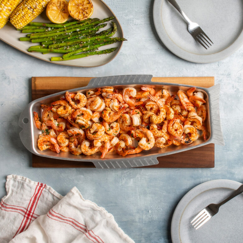  Image of grilled shrimp in Nordic Ware fish griller in serving scene