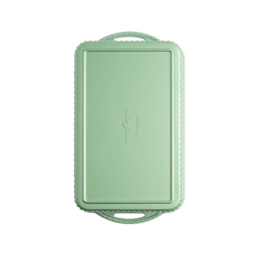 overhead view of cardamom aluminum baking pan with green exterior coating