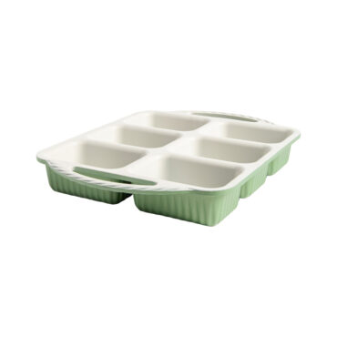 aluminum mini loaf pan with 8 rectangular cavities, green exterior with white ceramic nonstick finish