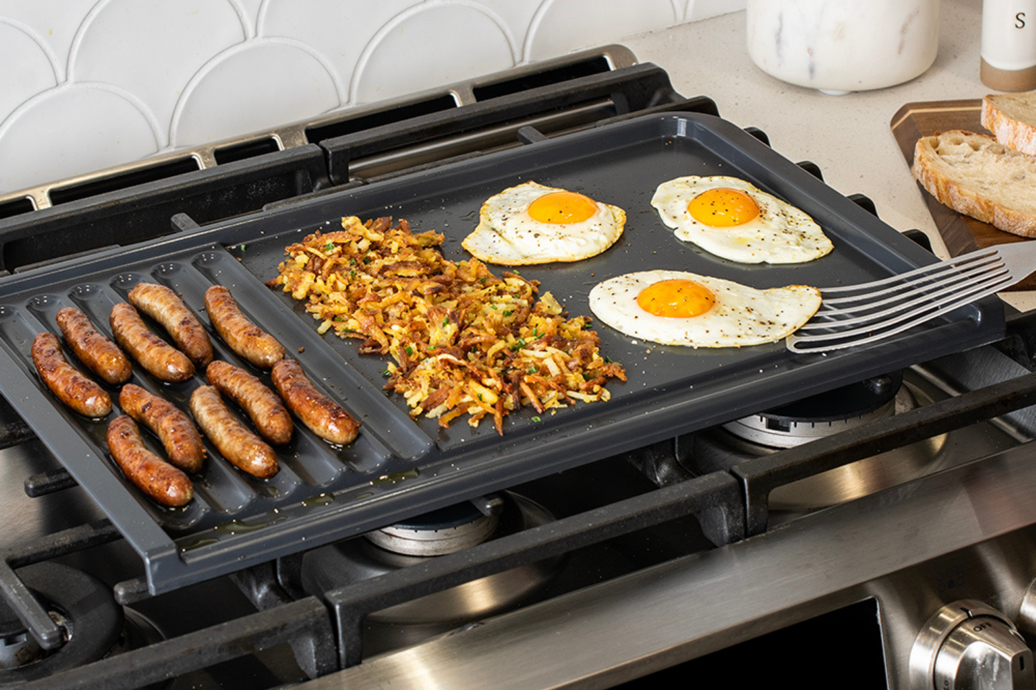 Cooking breakfast on a Nordic Ware Basalt Dual Top Grill Griddle.