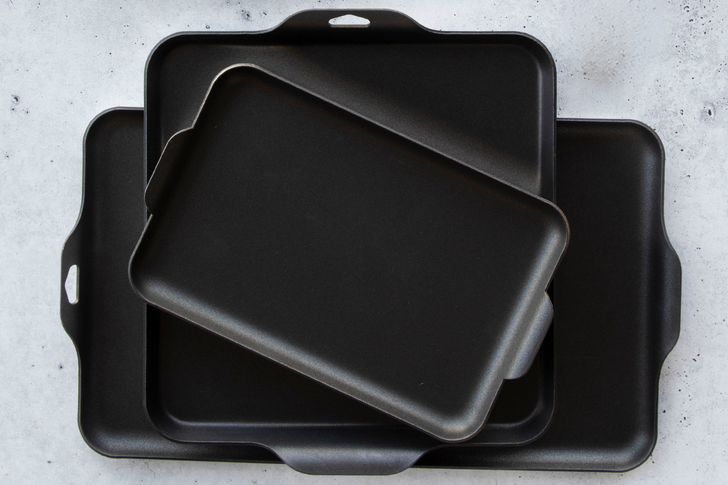 Stack of Nordic Ware griddles in various sizes.