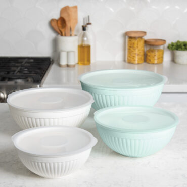Nordic Ware 8 piece seaglass and white 7 quart, 5 quart, 3.5 quart and 2 quart bowls with lids