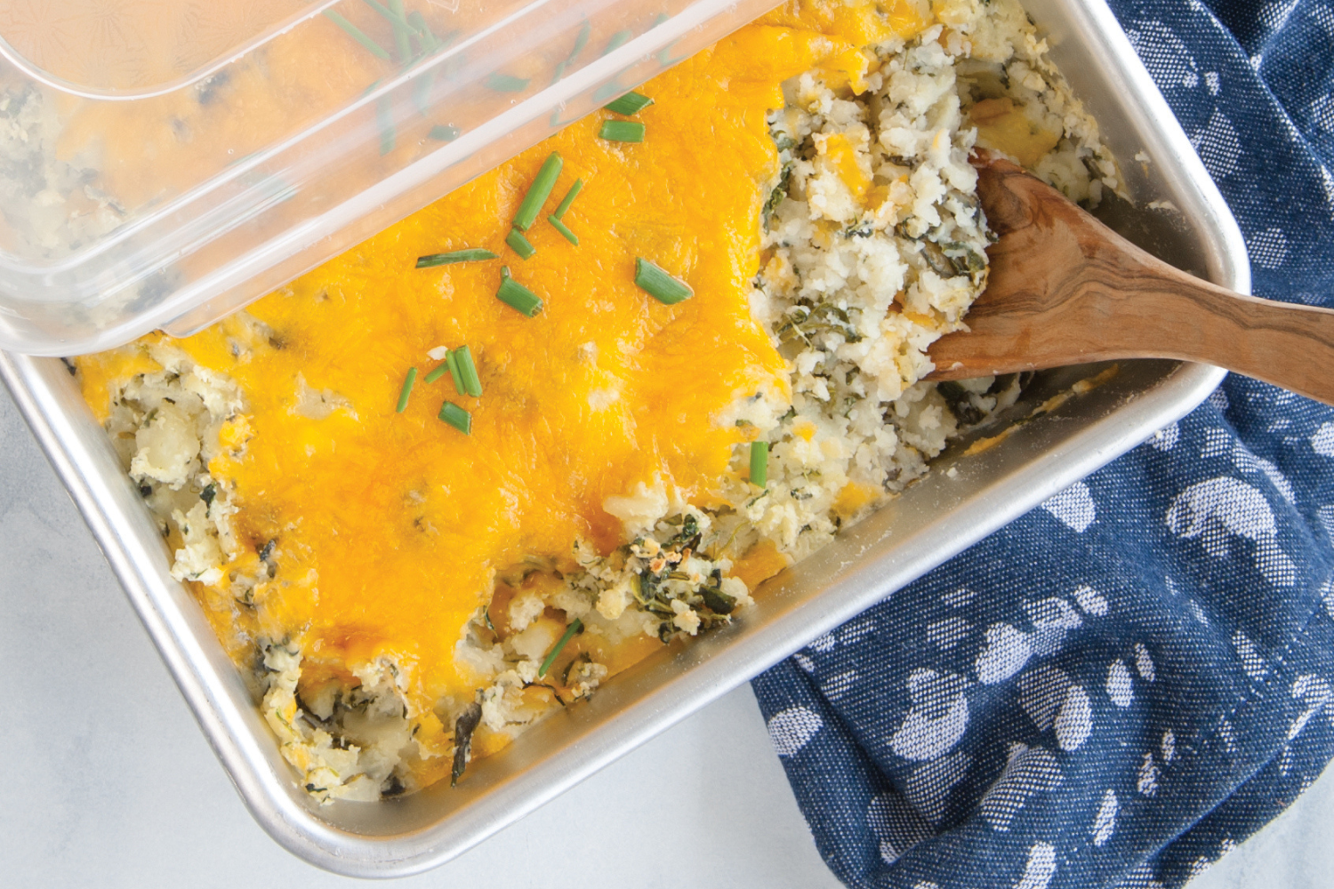 Potato bake made in the Naturals® 9" x 13" Rectangular Cake Pan with Storage Lid